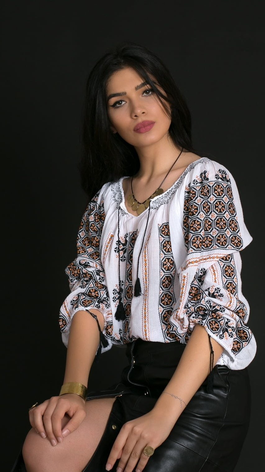 Step Into A World Of Tradition With 'Roa', A Handmade Romanian Blouse Adorned With Cotton And Silk Embroidery. Symbolic Wheel Motifs And A Cascade Of Hand-Stitched Stars Make This Piece A Celebration Of Life'S Cyclical Nature, Enhancing Your Aura With Beauty And Positivity